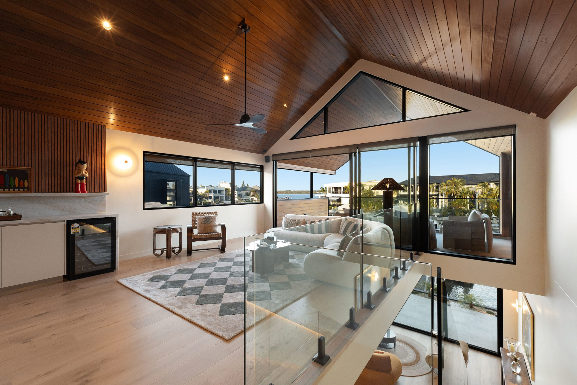 Split-level interior with vaulted timber ceilings
